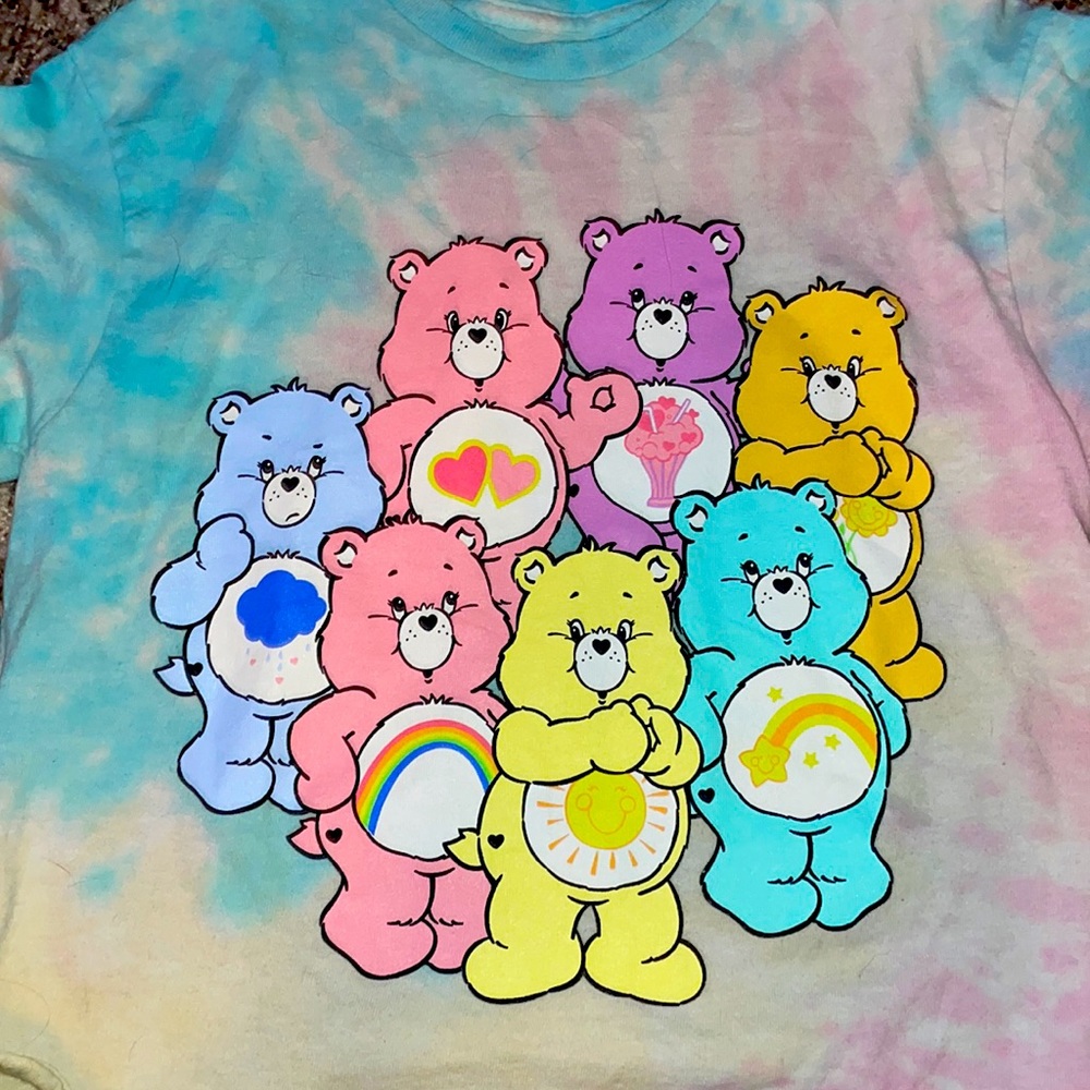 This shirt is tie-dye, with original care Bears on it with no state